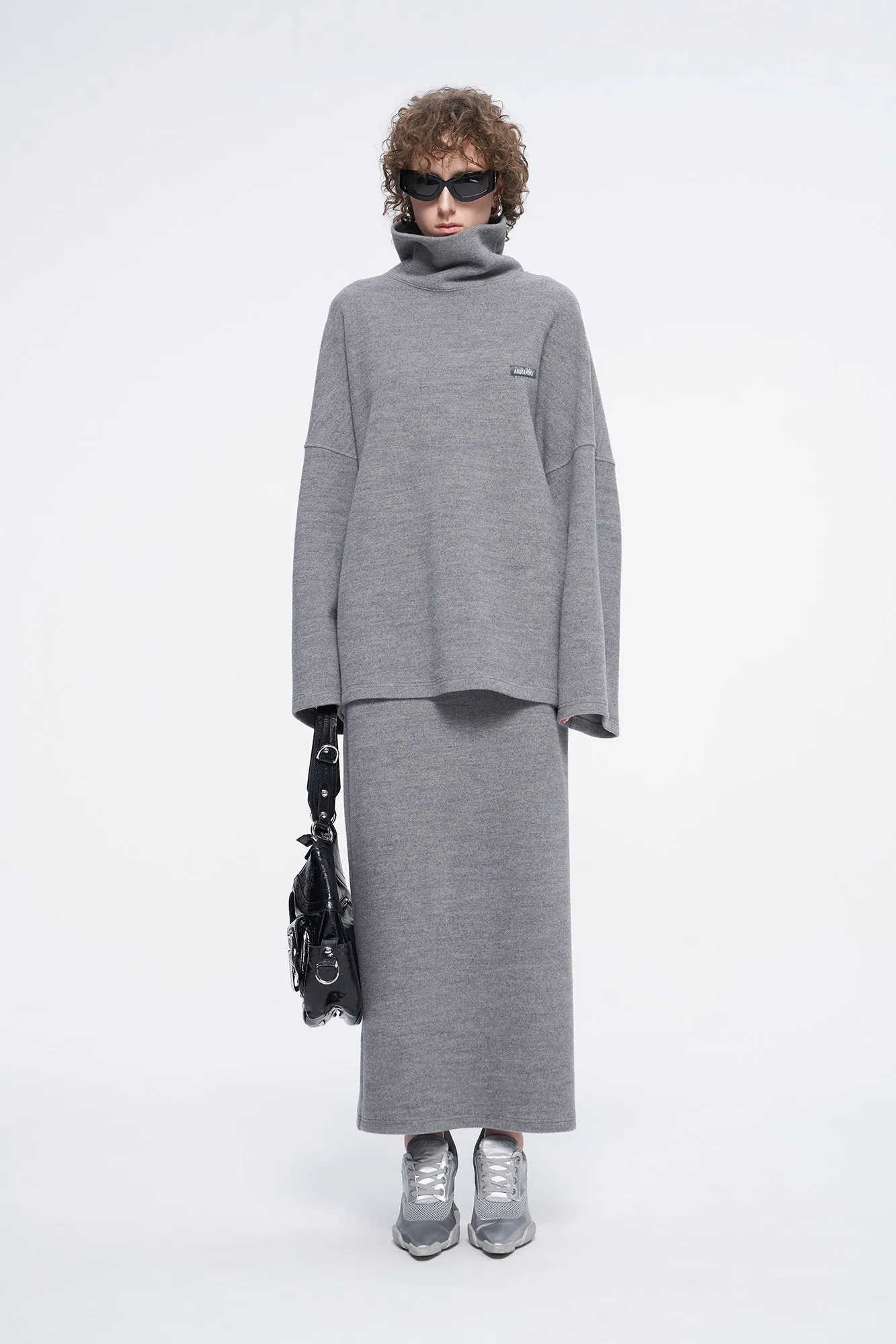 high-necked sweater with a loose silhouette