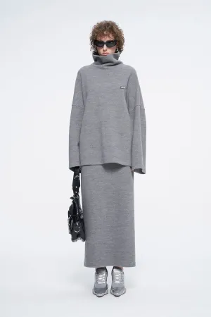 high-necked sweater with a loose silhouette