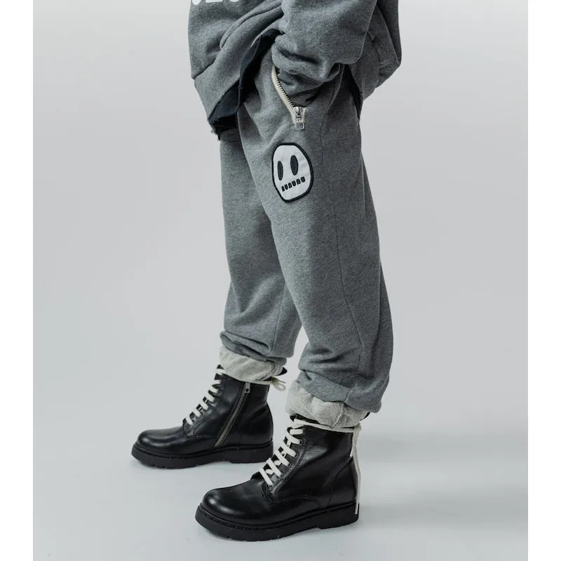 NUNUNU Smile Sweatpants